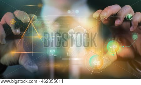 Male Hands Holding A Futuristic Device With Nft Infographics