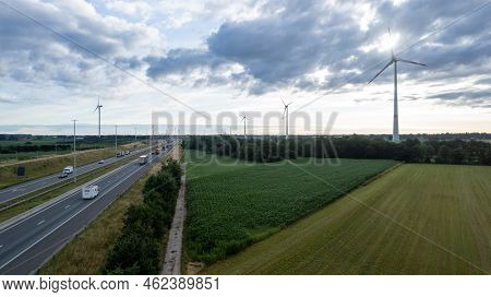 Brecht, Belgium, 6th Of July, 2022, Panoramic Aerial Drone View Of Wind Farm Or Wind Park, With High