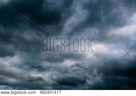 A Dark Blue Cloudy Sky. Cumulus Clouds. Nature Background. Bad Weather Forecast. Before A Thundersto