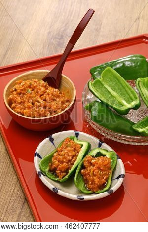 chilled fresh green peppers and Niku Miso (ground pork miso dip), a Japanese appetizer