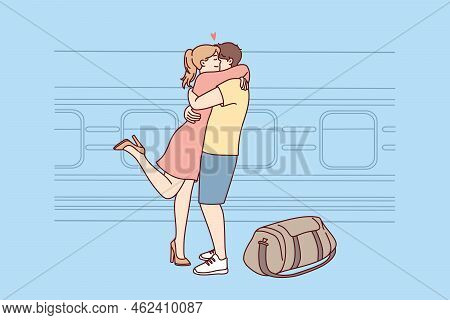 Happy Couple Hug Meet At Railway Station. Smiling Girl Embrace Guy Welcome Near Train. Long Distance