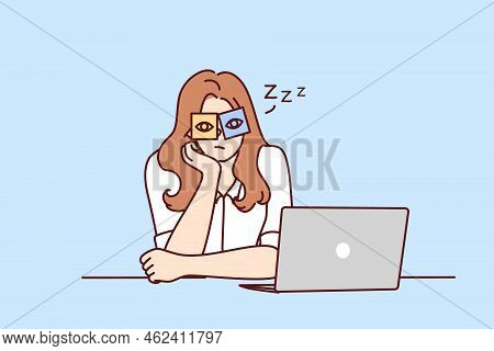 Exhausted Young Woman Sit At Desk Work On Computer Overwhelmed With Office Job. Tired Girl Feel Slee