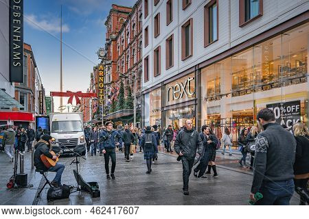 Dublin, November 2019 Henry Street Decorated For Christmas With People In Festive Mood. The Spire On