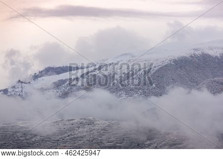 Beautiful Mountain Landscape In Winter. Mountains In Snow And Fog. Panoramic View From The Gunib Vil