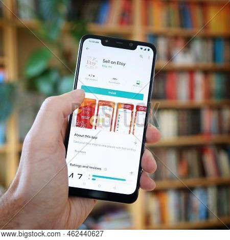 Warsaw, Poland - January 29, 2021: User Installing Sell On Etsy Craft Shopping Mobile App On An Andr