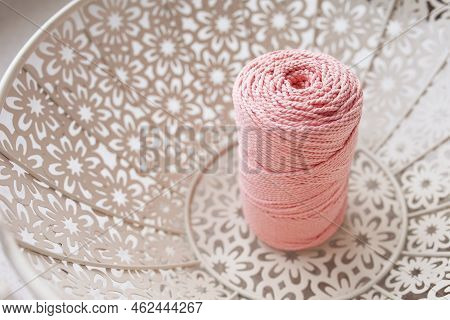 Handmade Macrame Braiding And Cotton Threads In White Basket. Cotton Macrame Cords And Ropes Against