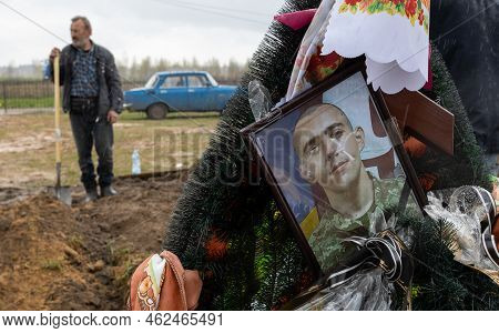 Bucha, Ukraine, 10-04-2022: Men Work Making The Grave Where They Will Bury Reservist Soldiers Who Di