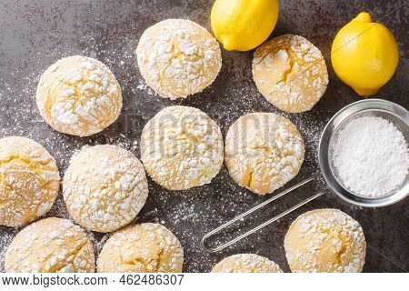 Homemade Cracked Lemon Cookies With Powdered Sugar And Zest Close-up On The Table. Horizontal Top Vi