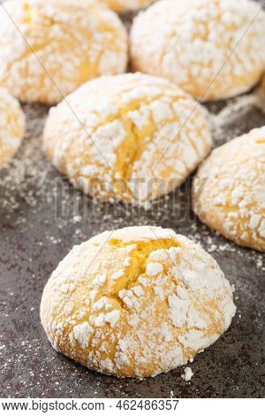 Cracked Lemon Cookies With Powdered Sugar Closeup On Table. Vertical