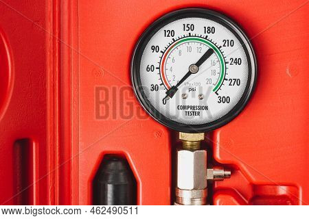 Engine Compression Tester. Set For Testing The Internal Combustion Engine. Monometer Close-up.