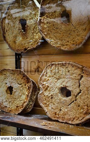 Showcase With Large Friselle - A Traditional Italian Type Of Bread. This Pastry Can Be Stored For A 