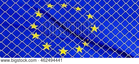 3d Render Of European Union Flag Behind Steel Mesh Wire Fence.  The Flag Of Ue.