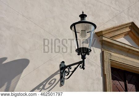 Historicizing Style Of Lamp That Is Not Gas But Led Lights. Lantern Frame Without Glass Filling. His