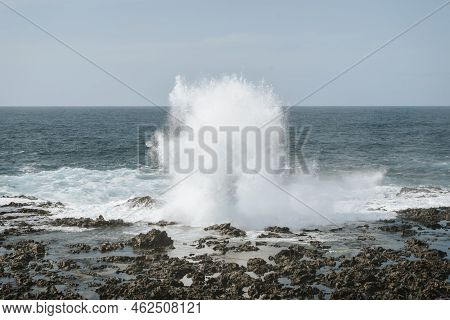 Water Splash On Black Volcanic Rocks Of Tenesar, Lanzarote, Canary Islands