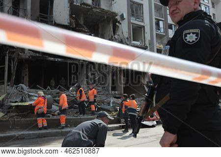 Kyiv, Ukraine, 04-29-2022: Ukrainian Police Guard A Building Where A Russian Army Rocket Fell In The