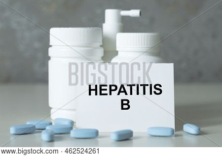 A Card With Text Hepatitis B On A Table With A Pills