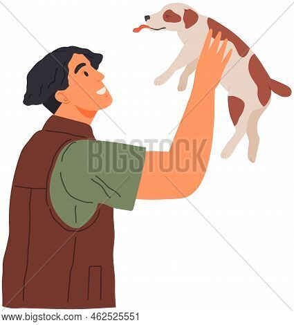 Male Pet Owner Plays With Little Dog. Caring For Four-footed Friend Concept. Happy Man Holding Cute 
