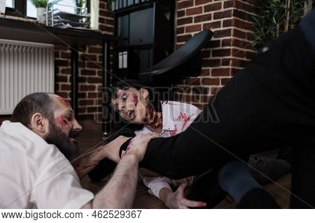 Businessman Running From Devil Cruel Zombies, Escaping Undead Spooky Monsters Attack In Office. Bloo