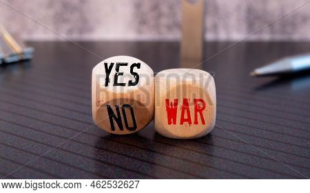 Wooden Blocks With The Words War, Yes And No. Conflict Between Political States And Factions. Armed 