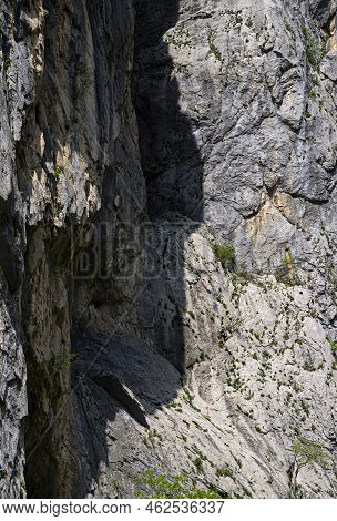 Paklenica, Croatia, Eu - June 25, 2022: Distant View Of Mountain Climber In National Park Paklenica.