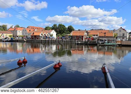 Askersund, Sweden, 22 August 2022: Summer View Of The Pretty Waterfront Buildings In Askersund. Aske