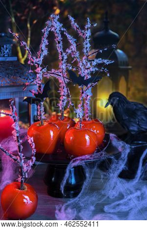 Halloween Dessert. Poisoned Blood Caramelized Glazed Candy Apple. Snow White Poison Lollipops.