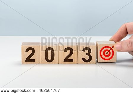 2023 Action Plan. Cubes With Text 2023, Plan, Goal, Action. To Do List And Plan For Next Year. Woode