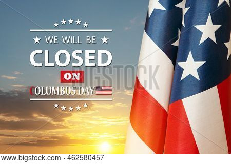 American Flag On Background Of Sunset Sky With A Message. We Will Be Closed On Columbus Day.