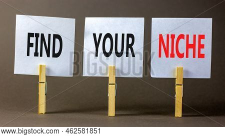 Find Your Niche Symbol. Concept Words Find Your Niche On White Papers On Wooden Clothespins. Beautif