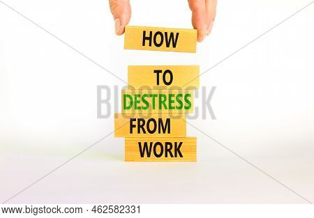 Destress From Work Symbol. Concept Words How To Destress From Work On Wooden Blocks. Doctor Hand. Be