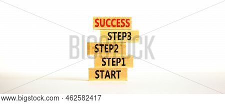 Strat, Step And Success Symbol. Concept Words Start Step 1 2 3 Success On Wooden Blocks On A Beautif
