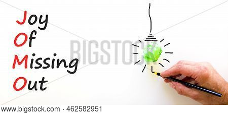 Jomo Joy Of Missing Out Symbol. Concept Words Jomo Joy Of Missing Out On Beautiful White Background.