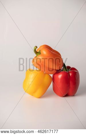 Bulgarian Pepper Of Different Colors On A White Background