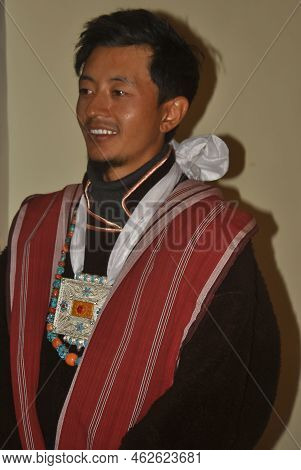 Closeup Of A Happy Ladakhi Groom From Zanskar Valley Looking Sideways With Wearing Traditional Cloth