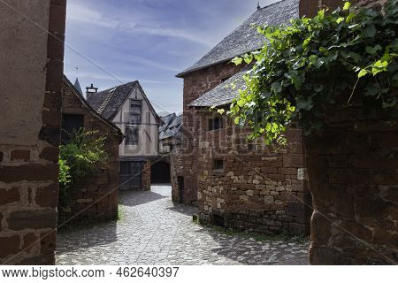 Collonges La Rouge, Distinctive Red Brick Houses And Towers Of The Medieval Old Town, France. It Is 