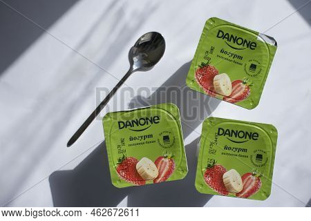 September 25, 2022 Ukraine City Of Kyiv Danone Yogurt On A Colored Background