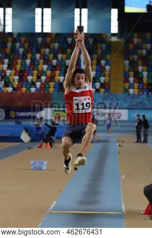 Istanbul, Turkey - March 05, 2022: Muhamet Cengeli Long Jumping During Balkan Athletics Indoor Champ