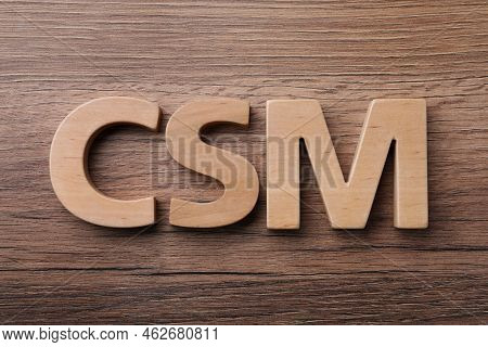 Abbreviation Csm (customer Service Management) Made Of Letters On Wooden Background, Flat Lay