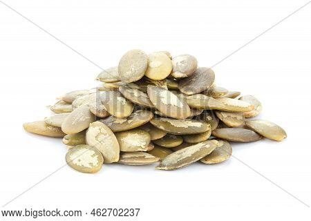 Pumpkin Seeds On White Background. Green Pepita Seeds. Top View.