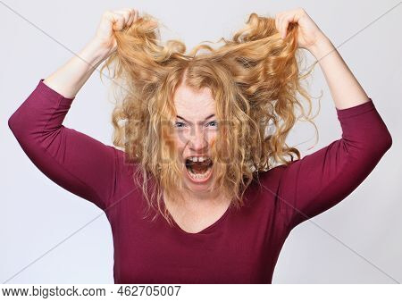 Woman Screaming And Keeping Her Hair Up