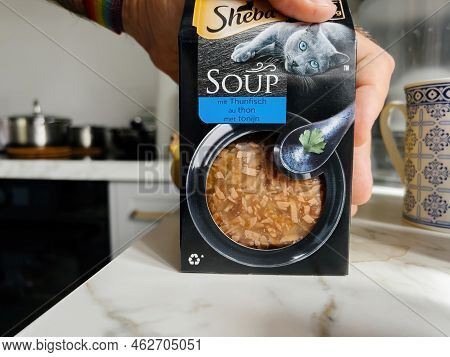 Paris, France - Sep 13, 2022: Pov Male Hand Holding Carton Package With Sheba Soup With Tuna Fish - 
