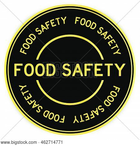 Black And Gold Color Round Label Sticker With Word Food Safety On White Background