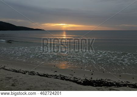 Summer Sunrise Over Golden Beach (skala Potamias) In Greece With An Overcast Sky.