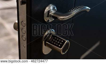 Open Door To The Apartment With A Combination Lock. Keyless Entry.
