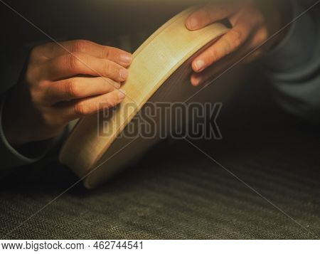 Woman Violinmaker At Work With The Fiddle