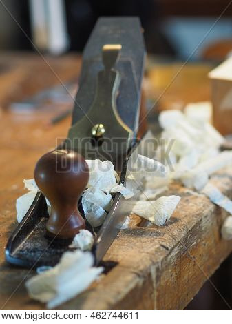 Close Up Of Professional Master Artisan Luthier Painstaking Detailed Work On Wood Violin In A Worksh