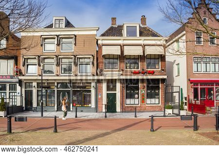 Purmerend, Netherlands - March 31, 2021: Facades Of Historic Houses On The Koemarkt Square In Purmer