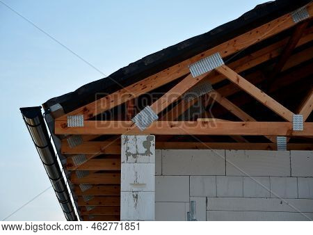The Trusses Are Made From High-quality, Strength-graded Lumber And Connected By Steel Buttplates Wit