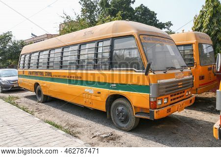 Delhi, India - February 25, 2022: Old School Bus Sml In The City Street.