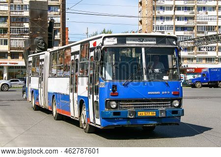 Ekaterinburg, Russia - May 8, 2010: Articulated Urban Bus Ikarus 283.10 In The City Street.